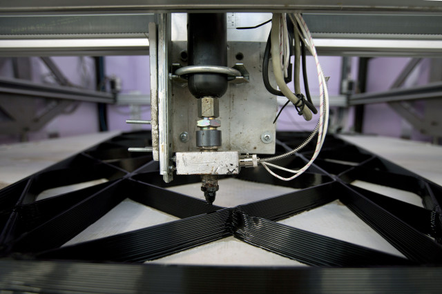 A 3D printer constructs the building blocks for a canal house in Amsterdam, Netherlands, March 13, 2014. (AP)