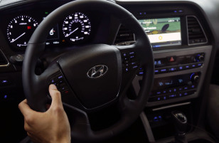 An Android employee gives a demonstration of Android Auto during Google I/O 2014 in San Francisco, California, June 25, 2014. (AP)