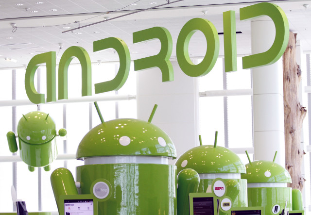FILE - Android mascots are lined up in the demonstration area at the Google's I/O Developers Conference in San Francisco, California, May 10, 2011. (Reuters)