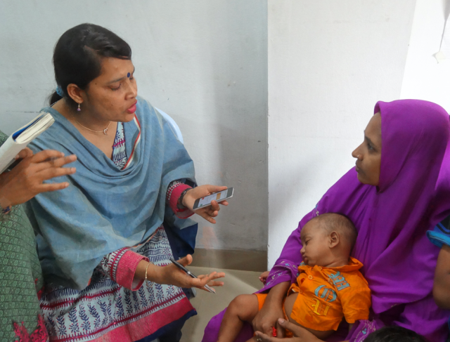     Community health workers in Bangladesh use the MEDSINC platform during early trials. (THINKmd)