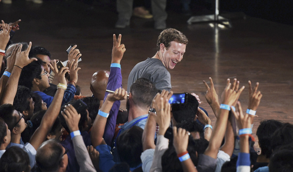 Facebook's CEO Mark Zuckerberg interacts with technology students in a town hall-style meeting in New Delhi, Oct. 28, 2015. During his second visit to India, Zuckerberg rejected criticism that his free Internet access platforms are a luxury for people who cannot afford it. (AP)