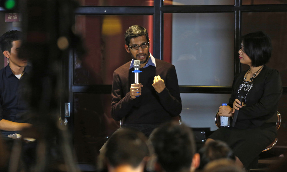 Google CEO Sundar Pichai (C) addresses a conference with Vietnamese IT community in Hanoi, Vietnam, Dec. 22, 2015. (Reuters)