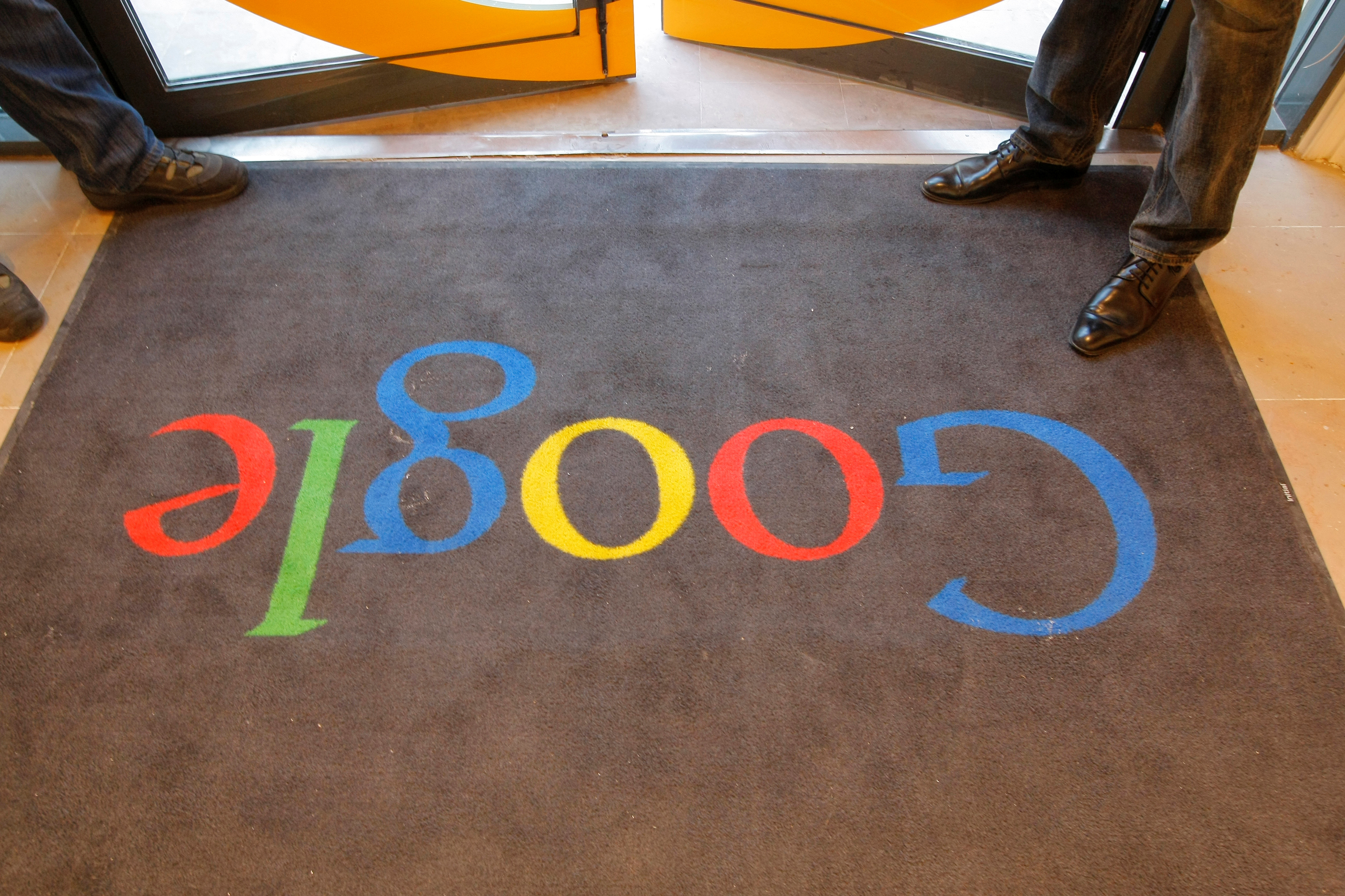 A Google carpet is seen at the entrance of the new headquarters of Google France before its official inauguration in Paris, France, Dec. 6, 2011. (Rueters)