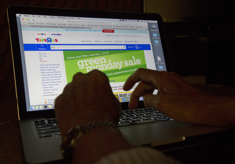 FILE - An online user searches different sites as he shops online. (AP)