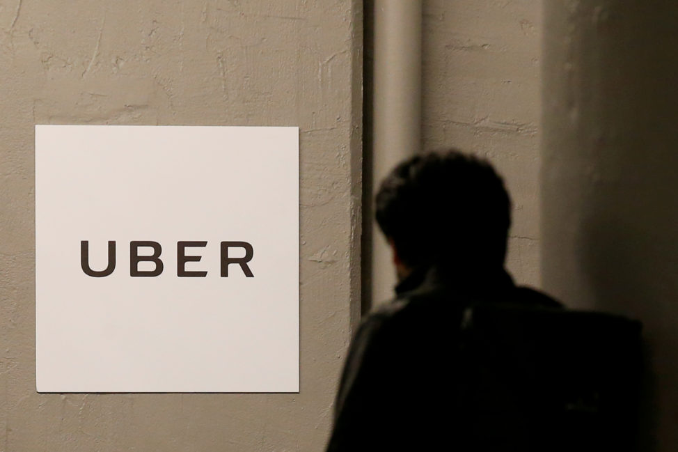 A man arrives at the Uber offices in Queens, New York, U.S., Feb. 2, 2017. (Reuters) 