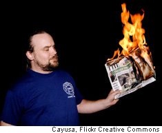 Burning newspapers