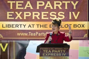 Former U.S. vice presidential candidate speaks at the kickoff of her “Tea Party Express” bus tour in October.  Not sure what the “IV” is for. (AP Photo)