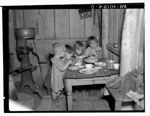 This Christmas dinner, in the Pauley family’s house near Smithfield, Iowa, was anything BUT elegant.  It consisted of potatoes, cabbage, and a pie.  (Library of Congress)