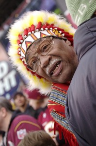 Columnist Malloy, a black man like the Redskins' "unofficial" mascot, Zema "Chief Zee" Williams, has written that the "Chief" should think about the appropriateness of his actions.  (JAGalicious, Flickr Creative Commons)