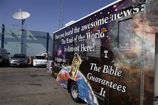 This message, similar to ones that the Family Radio Network posted on billboards across the nation, appeared on the side of a semi-truck outside Camping's Oakland headquarters.  (AP Photo/Jose Sanchez)