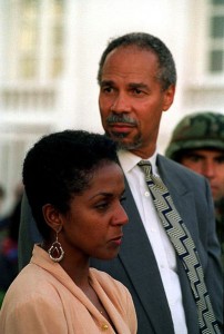 Robinson, shown here with his wife, Hazel, at an inaugural event in Haiti in 2004, quit TransAfrica three years earlier and exiled himself to the French Caribbean island of St. Kitts.  (U.S. Marine Corps)