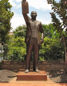 This Juneteenth statue in Galveston, where the South's last known slaves were freed, depicts a reading of the Emancipation Proclamation.  (Nicholas, Flickr Creative Commons)