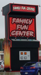 This oversized welcome structure outside a gaming parlor notwithstanding, not all video games are "family fun."  (KB35, Flickr Creative Commons)