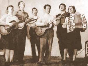 Pete, second from the left, and Woody Guthrie, center, were part of the short-lived "Almanac Singers."  (Library of Congress)