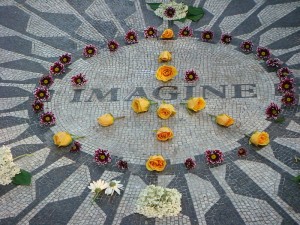 A peace sign made of flowers at the Strawberry Fields memorial.  (Killagb, Wikipedia Commons)