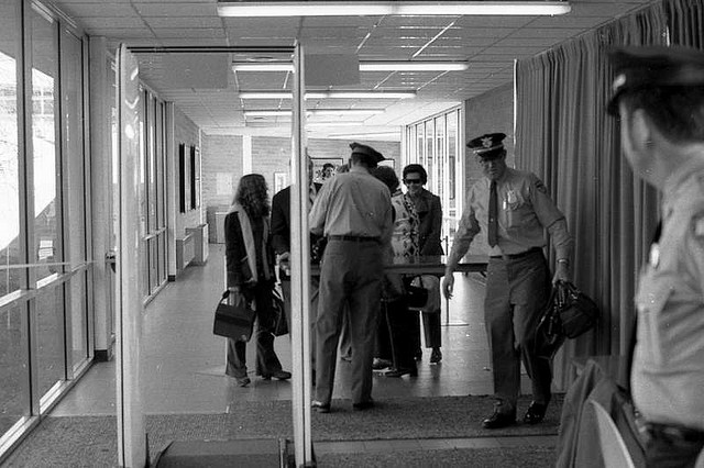 Modern airport security, brought to by D.B. Cooper and others.  (Hunter-Desportes, Flickr Creative Commons)