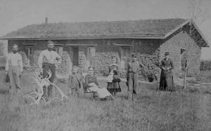 A family poses before their Custer County, Nebraska, sod house in 1886.  A “soddie” was one of the few options on the plains, where trees were scarce.  (Library of Congress)