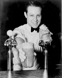 The term "soda jerk" derived from the counterman's tug on the valve that dispensed carbonated water.  (Library of Congress)