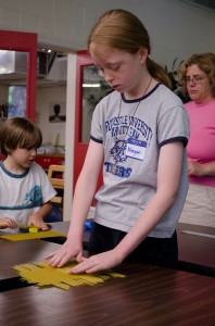 Students being homeschooled make a "pasta bridge."  (qwrrty, Flickr Creative Commons)