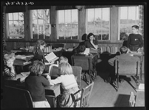 A teacher, Miss Holmes, watches over her flock in a Connecticut one-room schoolhouse in 1940.  (Library of Congress)