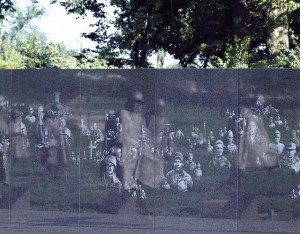 The patrol, reflected among the images on the Remembrance Wall.  (Carol M. Highsmith)