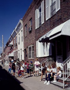 Family time on a rowhouse street in South Philadelphia.  (Carol M. Highsmith)