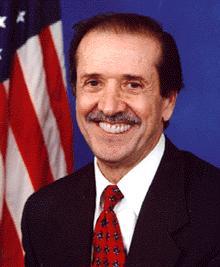 Sonny Bono had longer hair and wore beads when he was singing with Cher.  Here, he's a congressman. 