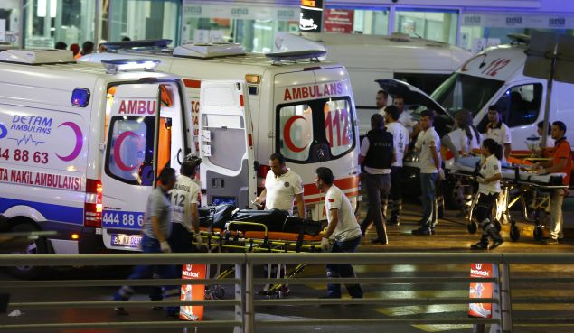 Paramedics push a stretcher at Turkey's largest airport, Istanbul Ataturk, Turkey, following a blast June 28, 2016. REUTERS/Osman Orsal - RTX2IR3E