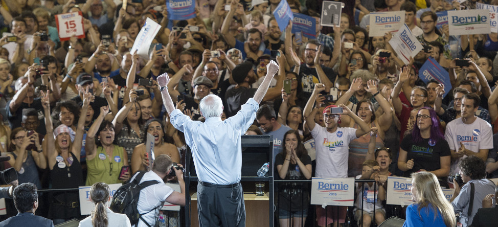 Democratic presidential candidate Sen. Bernie Sanders, I-Vt., lifts his arms in celebration as he speaks at a rally in Portland, Oregon on Aug. 9, 2015. (AP)
