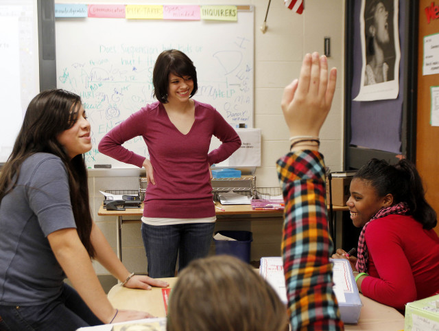 Teacher Erin Gavin listens to students during a group discussion with seventh-graders at a Brooklyn Center School in Brooklyn Center, Minn. on Feb. 4, 2011 (AP file) 