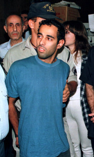 Yigal Amir is led into a Tel Aviv court on Nov. 6, 1995 where he confessed to killing Prime Minister Yitzhak Rabin. (Reuters)