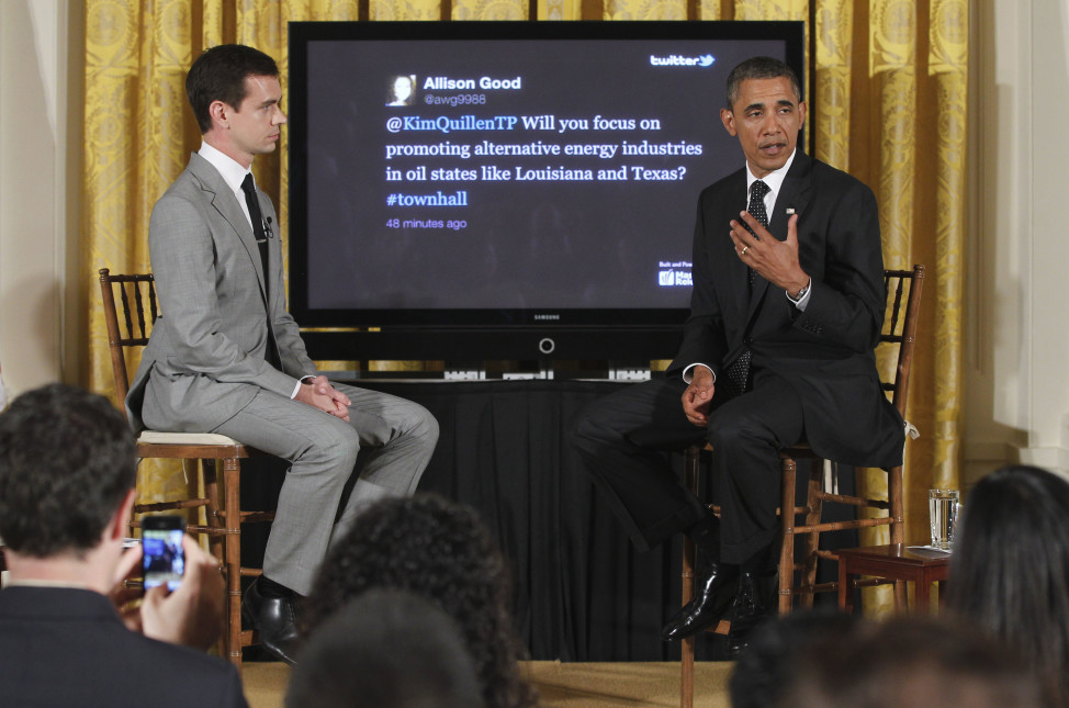 President Barack Obama sits with Twitter co-founder and Executive Chairman Jack Dorsey during a "Twitter Town Hall"  at the White House in Washington, July 6, 2011. (AP )