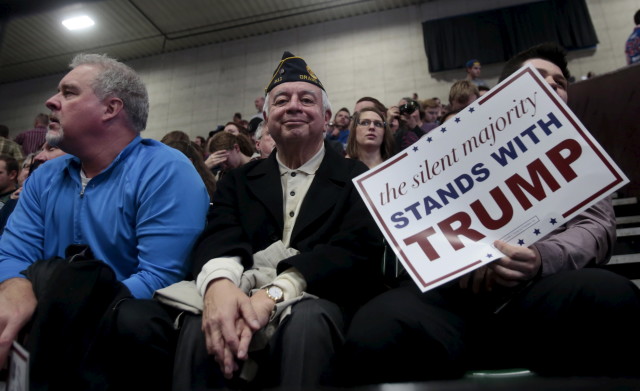 Bob Ortiz (C ) waits for Donald Trump to address a campaign rally in Grand Rapids, Michigan Dec. 21, 2015. (REUTERS) 