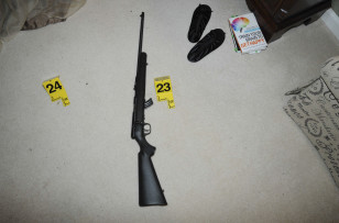A gun that was found at Adam Lanza's home is pictured in this evidence photo released by the Connecticut State Police