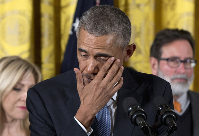 President Barack Obama wipes away tears on Jan. 5, 2016 at the White House, as he recalled the 20 first-graders killed in the 2012 shooting at Sandy Hook school in Conn. (AP)