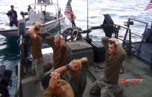 This frame grab from a Jan. 12, 2016 video by the Iranian state-run IRIB News Agency shows the detention of American Navy sailors by the Iranian Revolutionary Guards in the Persian Gulf, Iran. (AP)