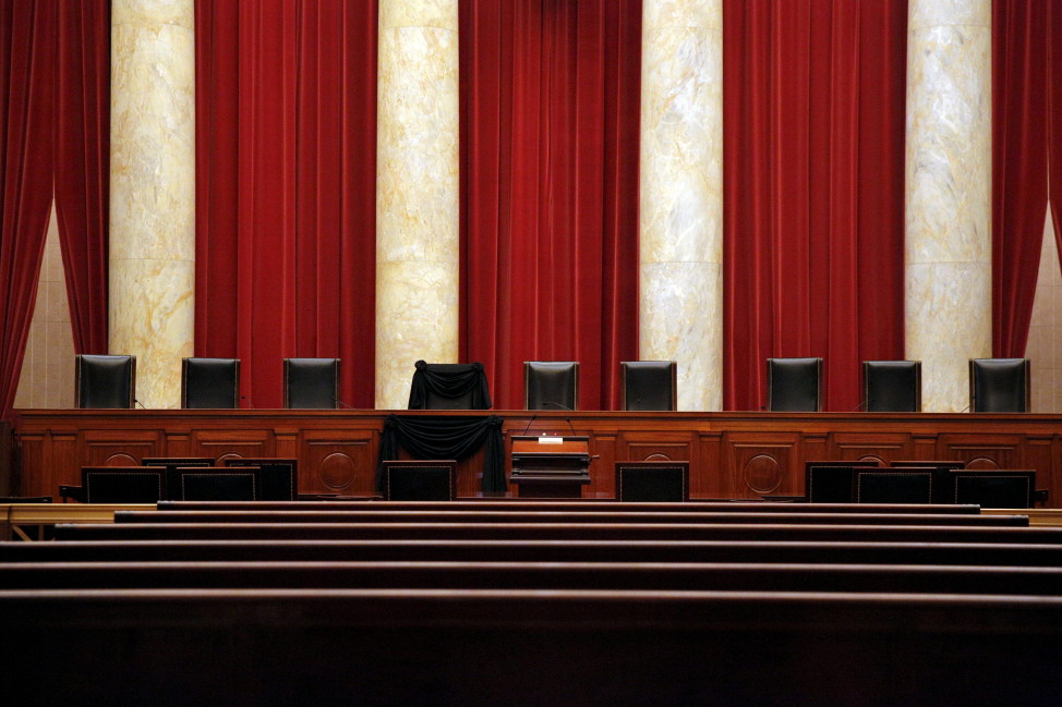 Black wool crepe adorns the bench of the late Justice Antonin Scalia inside the Supreme Court in Washington Feb. 16, 2016. REUTERS 