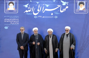 Iranian President Hassan Rouhani (2nd L) speaks as parliament speaker Ali Larijani ( L), Judiciary Chief Ayatollah Sadeq Larijani (2nd R), and the chief of the supreme leader's office Mohammad Golpayegani attend a ceremony in Tehran on Oct. 3, 2015. (Reuters) 
