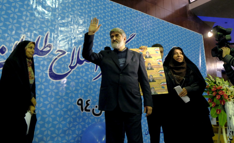Iranian lawmaker Ali Motahari waves to supporters in Tehran during a rally for parliamentary elections on Feb. 18, 2016. (Reuters)