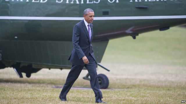 President Barack Obama crosses the White House South Lawn in Washington after arriving on Marine One helicopter from Andrew Air Force Base, Maryland, March 3, 2016.
