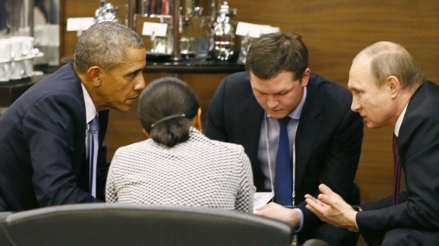 U.S. President Barack Obama (L) talks with Russian President Vladimir Putin (R) and U.S. security advisor Susan Rice (2nd L) prior to the opening session of the Group of 20 (G20) Leaders summit summit in the Mediterranean resort city of Antalya, Turkey November 15, 2015. (Reuters) 