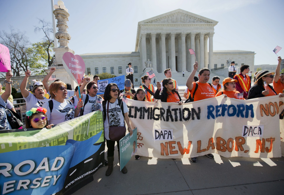 Supporters of fair immigration reform gather in front of the Supreme Court in Washington on April 18, 2016. (AP)