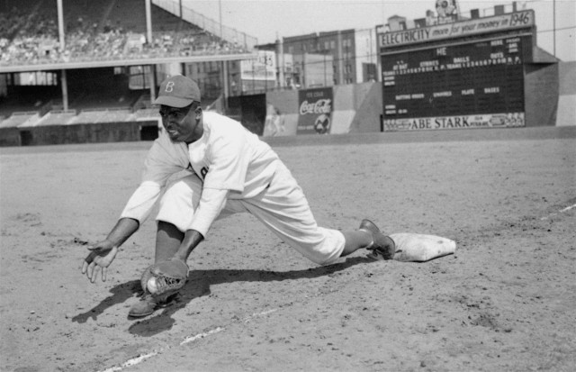 Jackie Robinson, Brooklyn Dodgers' first baseman, is shown at Ebbets Field, April 11, 1947.  (AP Photo)