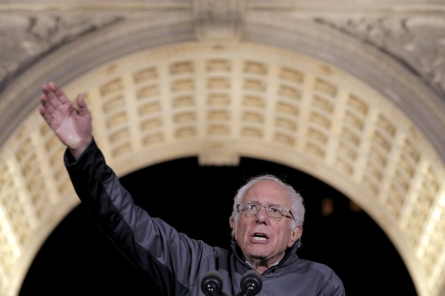 U.S. Democratic presidential candidate and U.S. Senator Bernie Sanders takes the stage at a campaign rally in Washington Square Park in the Greenwich Village neighborhood of New York