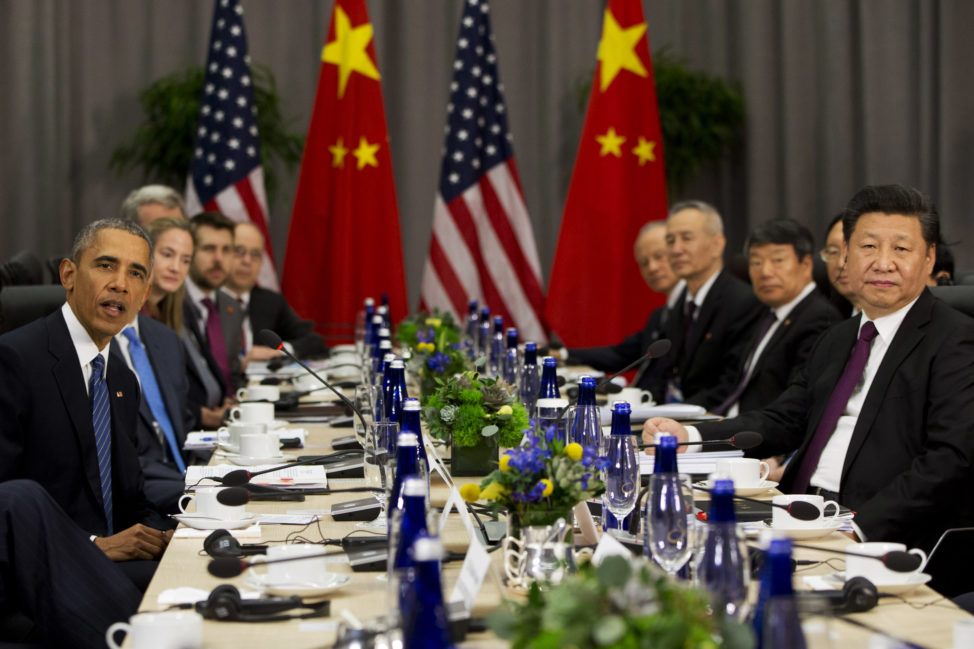 President Barack Obama speaks as he meets with Chinese President Xi Jinping during the Nuclear Security Summit in Washington, Thursday, March 31, 2016. (AP)