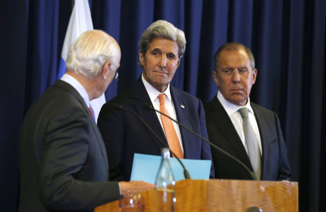 U.S. Secretary of State John Kerry, center, and Russian Foreign Minister Sergei Lavrov, right, look at U.N. special envoy Staffan de Mistura during a joint press conference following their meeting to discuss the crisis in Syria, in Geneva, Switzerland, Sept. 9, 2016. (AP)