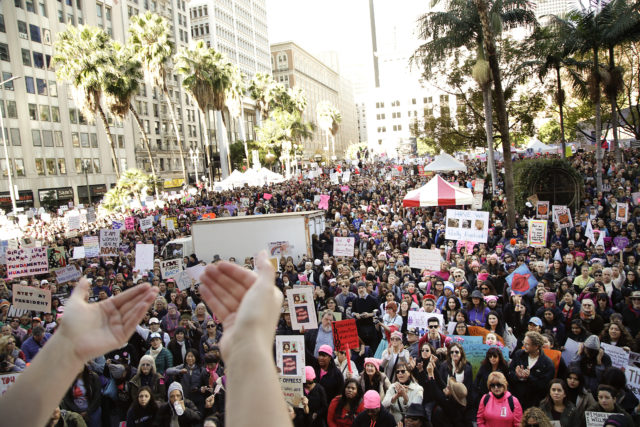 Protesters listen to a speaker as they gather for the Women's March against President Donald Trump, Jan. 21, 2017, in Los Angeles. The march is being held in solidarity with similar events taking place in Washington and around the nation. (AP)