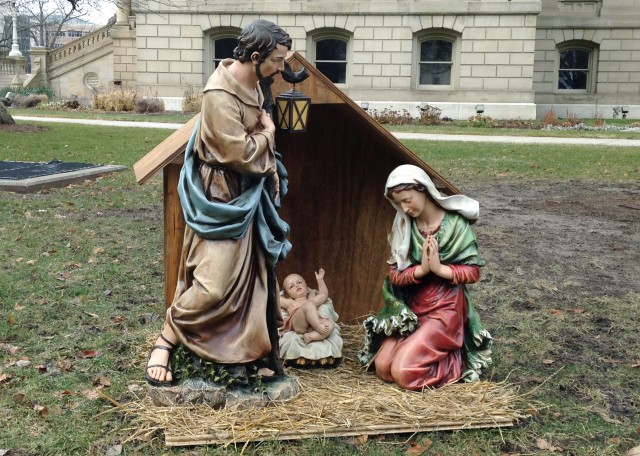 A nativity scene is displayed on the State House grounds in Lansing, Michigan, Dec. 19, 2014, two days before Satanists erected a competing display. (AP Photo) 