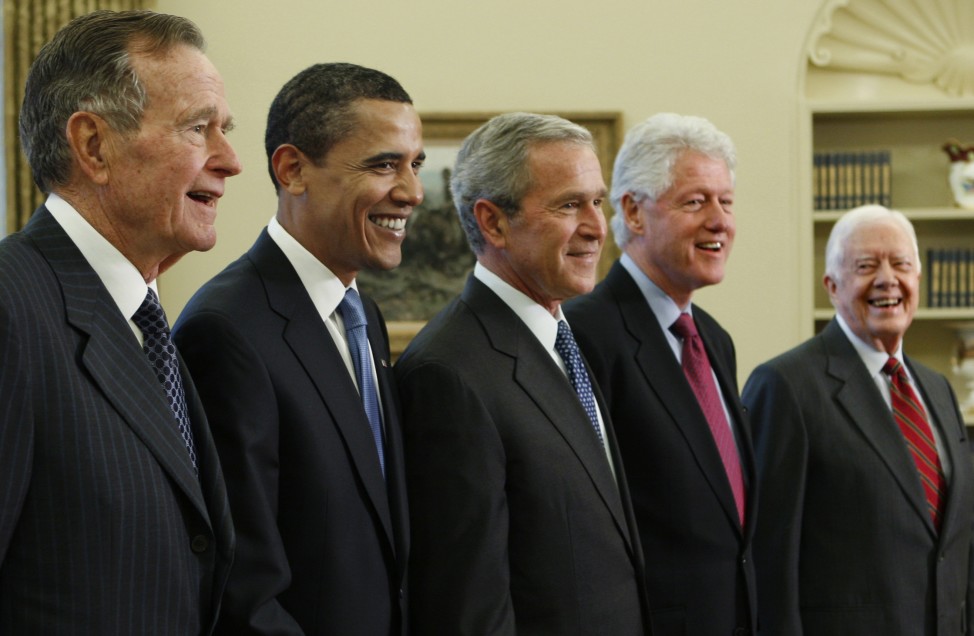 The so-called Presidents' Club. America's living presidents from left: Then President George W. Bush, center, poses with then President-elect Barack Obama, and former presidents, from left, George H.W. Bush, left, Bill Clinton and Jimmy Carter, right, Jan. 7, 2009, in the Oval Office of the White House in Washington. (AP Photo)