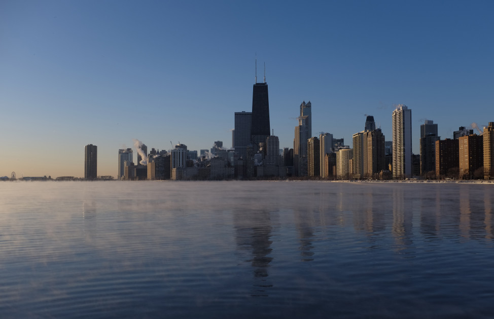 The sun rises on Lake Michigan in Chicago, Illinois. (AP Photo)